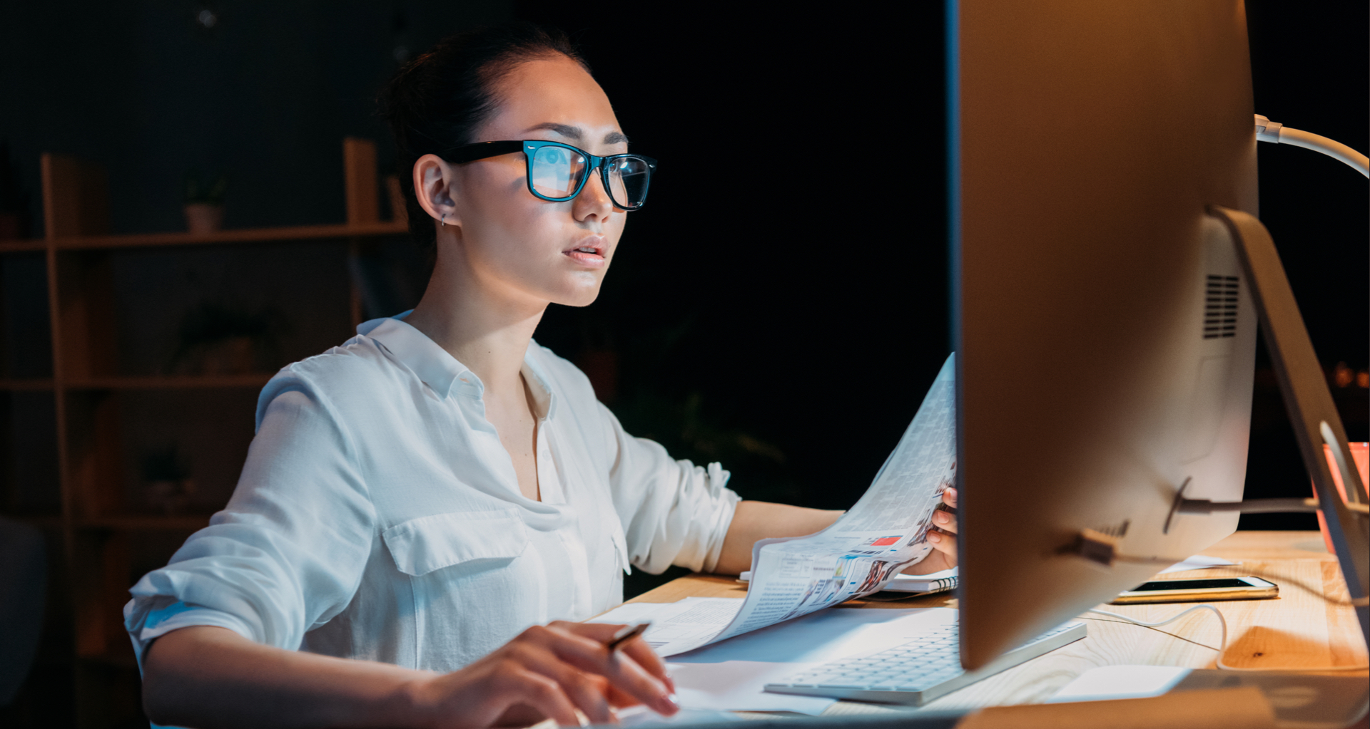 A woman working on Mac