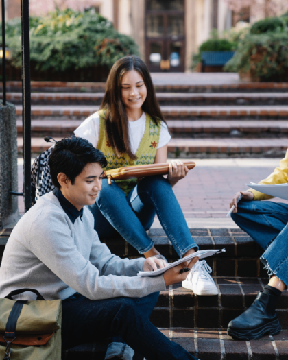 A group of student studying on college stairs