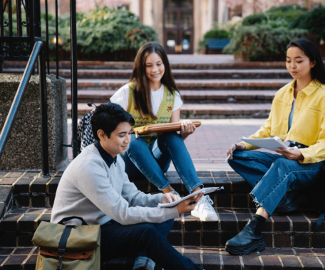 A group of student studying on college stairs