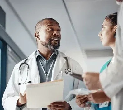 hospital-teamwork-doctor-folder-conversation-600nw-2442075907