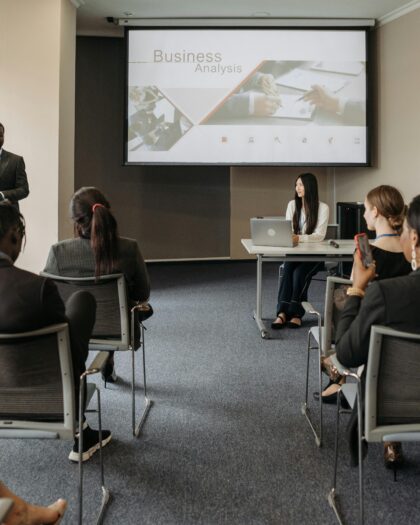 man giving lecture on business analysis