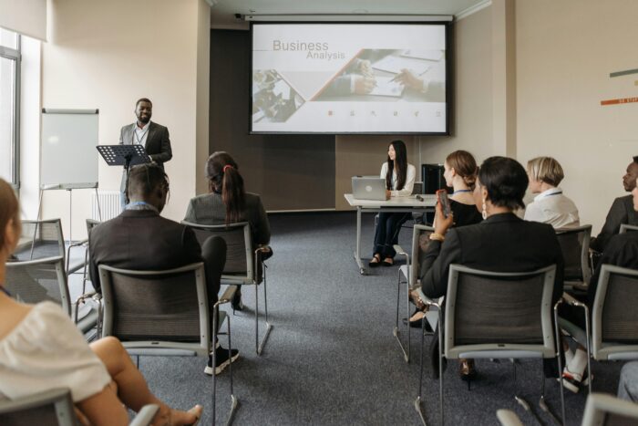 man giving lecture on business analysis