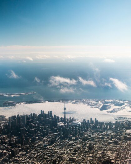 Airplane view of Toronto on the water during the day