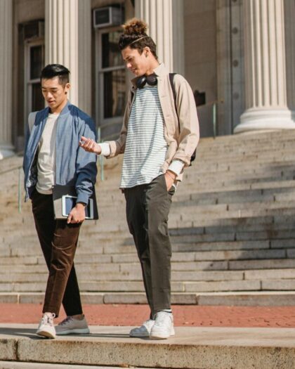 two students on the stairs of the met at Columbia University