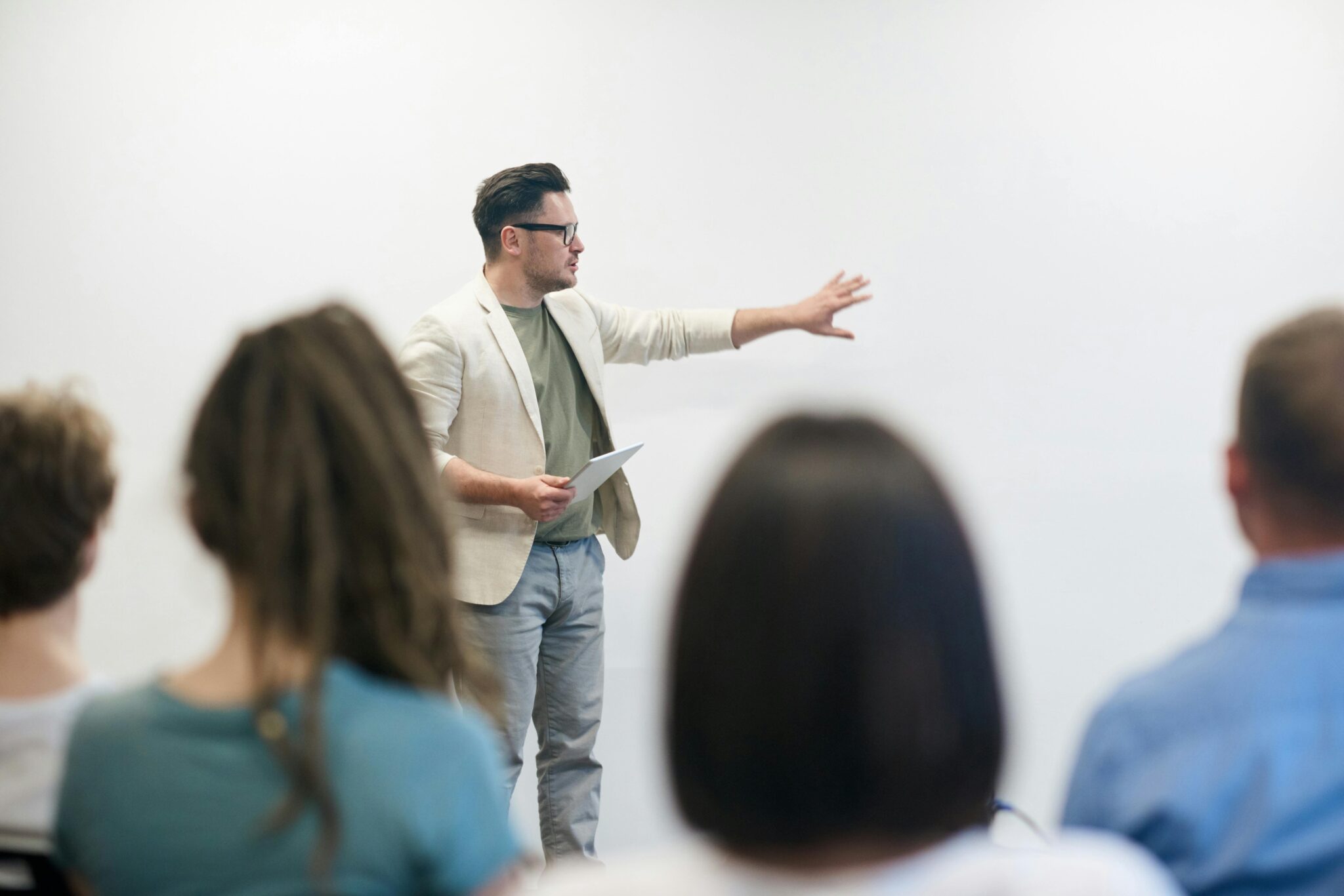 Man giving student lecture with whiteboard