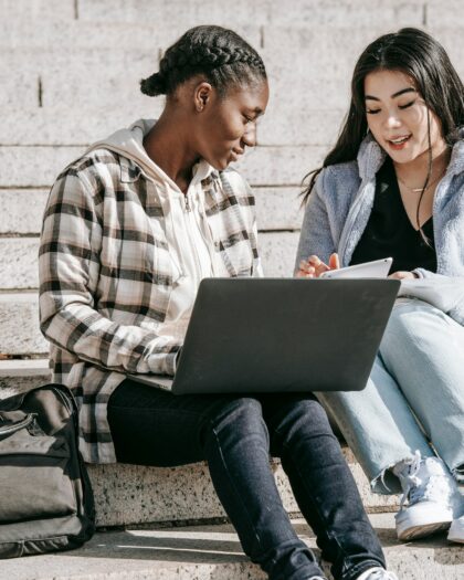 Concentrated students doing assignment together