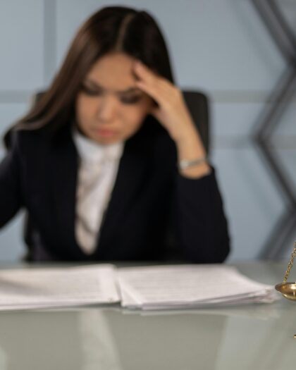 An Exhausted Lawyer Reading the Case Paper