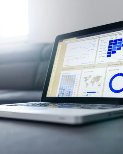 Laptop showing various graphs
