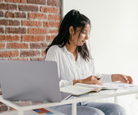 A Woman Doing Her Homework
