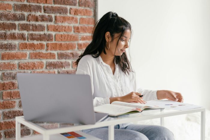 A Woman Doing Her Homework