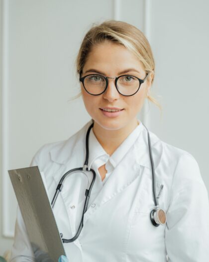 A Doctor Holding a Clipboard