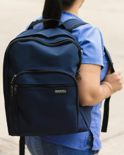 A Woman Wearing a Backpack