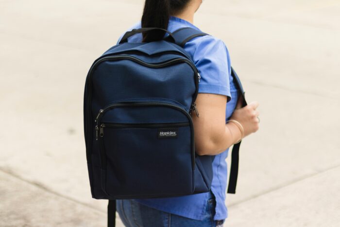 A Woman Wearing a Backpack