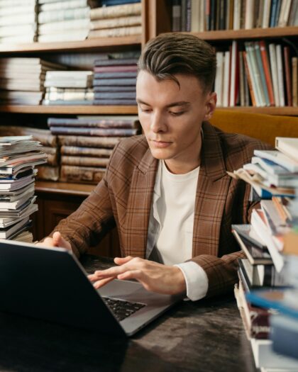 A Man using a Laptop