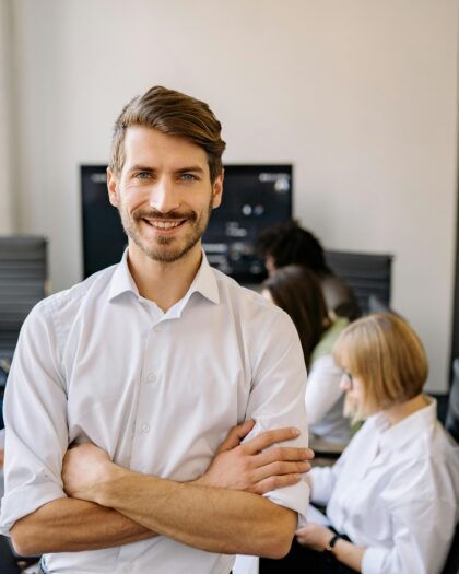 Man in White Long Sleeve Shirt Smiling