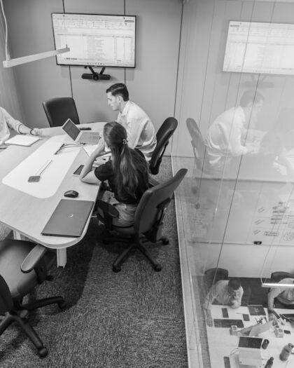 Team meeting in a modern conference room.