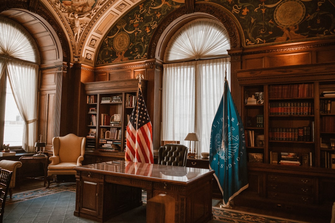 Grand office with flags and bookshelves