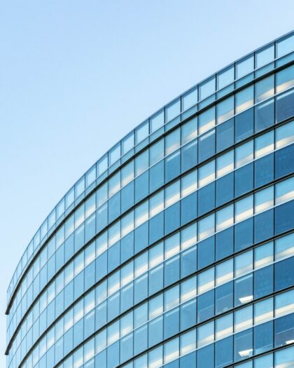 white and blue glass walled building